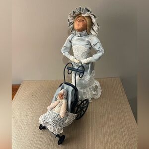 Byers Choice Carolers 1989.  Mother with baby in carriage.